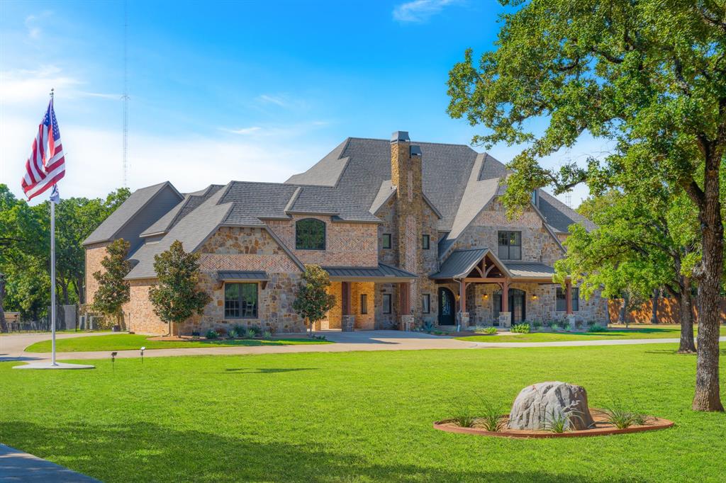 594 Turner Warnell Road Mansfield, TX 76063 - Photo 38 of 38 View of front facade featuring a front yard, a shingled roof, a porch, and a chimney