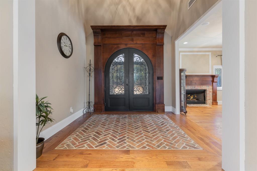 594 Turner Warnell Road Mansfield, TX 76063 - Photo 4 of 38 Entryway featuring real hardwood with brick inlay flooring, recessed lighting, and french doors