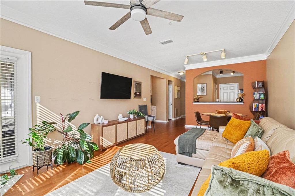 1319 Westchester Ridge Northeast Atlanta, GA 30329 - Photo 11 of 42 a living room with furniture and a flat screen tv