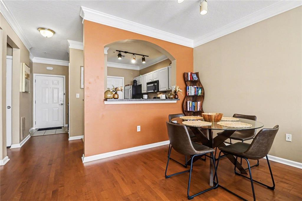 1319 Westchester Ridge Northeast Atlanta, GA 30329 - Photo 13 of 42 a view of a dining room with furniture and wooden floor