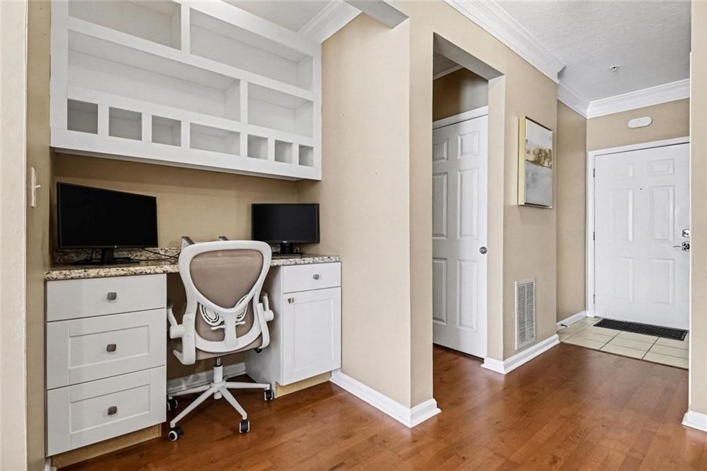1319 Westchester Ridge Northeast Atlanta, GA 30329 - Photo 18 of 42 a view of a workspace with furniture and wooden floor