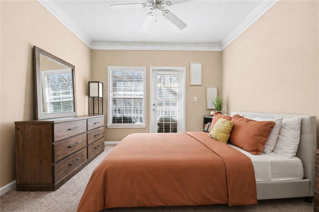 1319 Westchester Ridge Northeast Atlanta, GA 30329 - Photo 21 of 42 a bedroom with a bed and a window