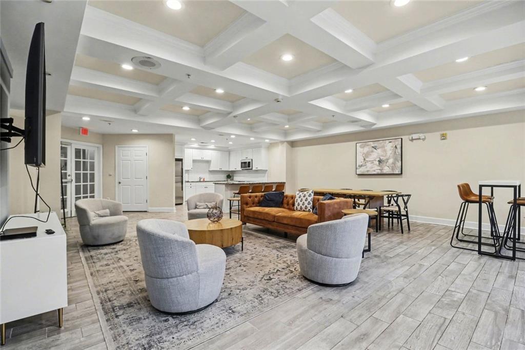 1319 Westchester Ridge Northeast Atlanta, GA 30329 - Photo 32 of 42 a living room with furniture and a wooden floor