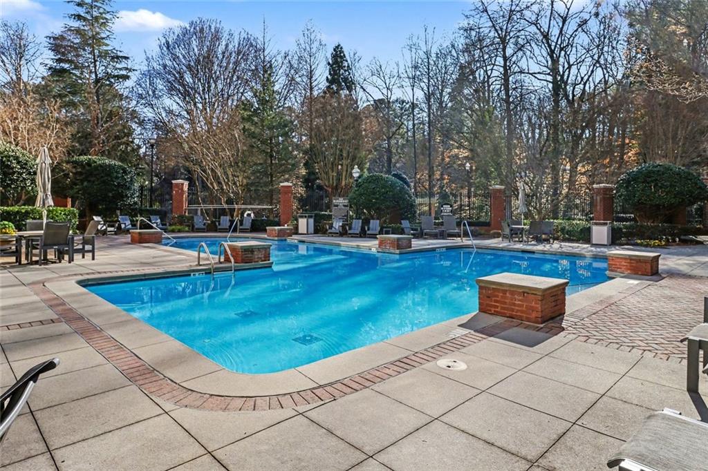 1319 Westchester Ridge Northeast Atlanta, GA 30329 - Photo 37 of 42 a view of a swimming pool with chairs