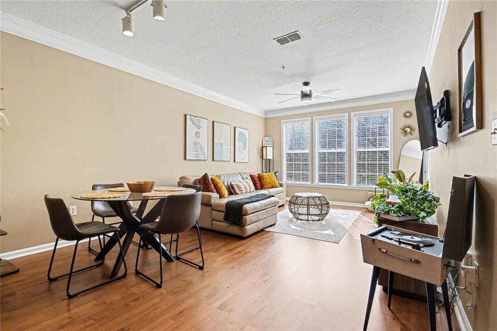 1319 Westchester Ridge Northeast Atlanta, GA 30329 - Photo 8 of 42 a living room with furniture and a potted plant
