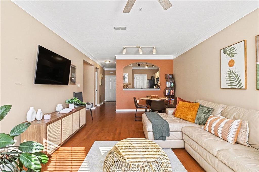 1319 Westchester Ridge Northeast Atlanta, GA 30329 - Photo 10 of 42 a living room with furniture and a flat screen tv