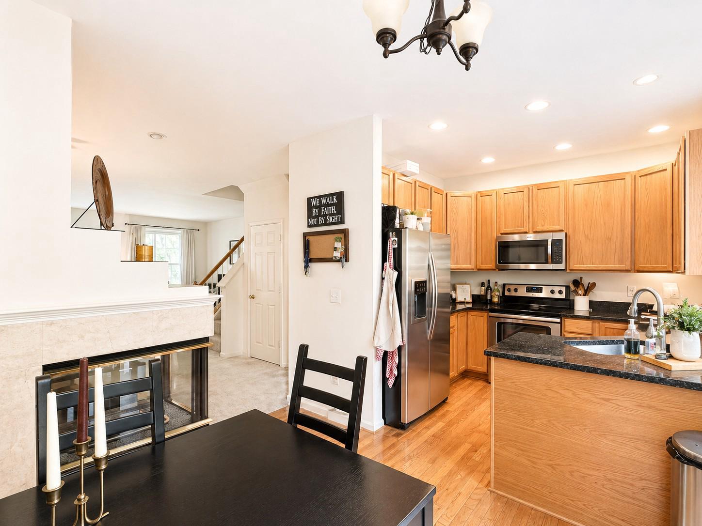1267 Wild Hawthorn Way Reston, VA 20194 - Photo 11 of 22 kitchen with warm wood accents.
