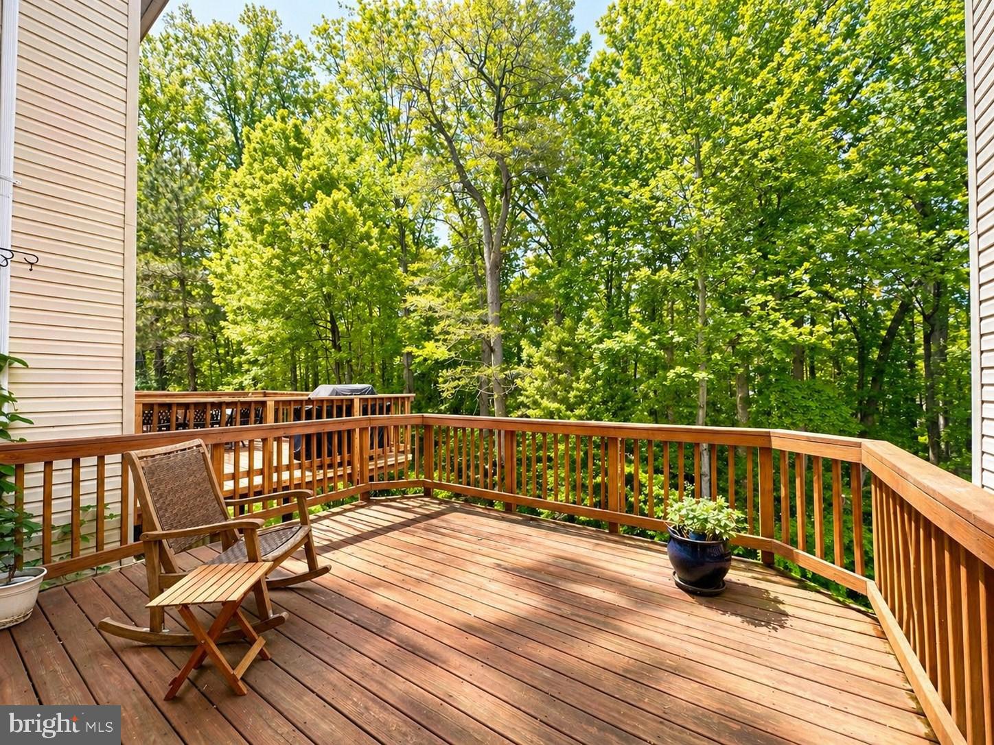 1267 Wild Hawthorn Way Reston, VA 20194 - Photo 21 of 22 Serene deck embraced by lush greenery.