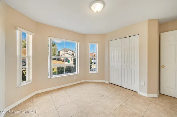 an empty room with windows