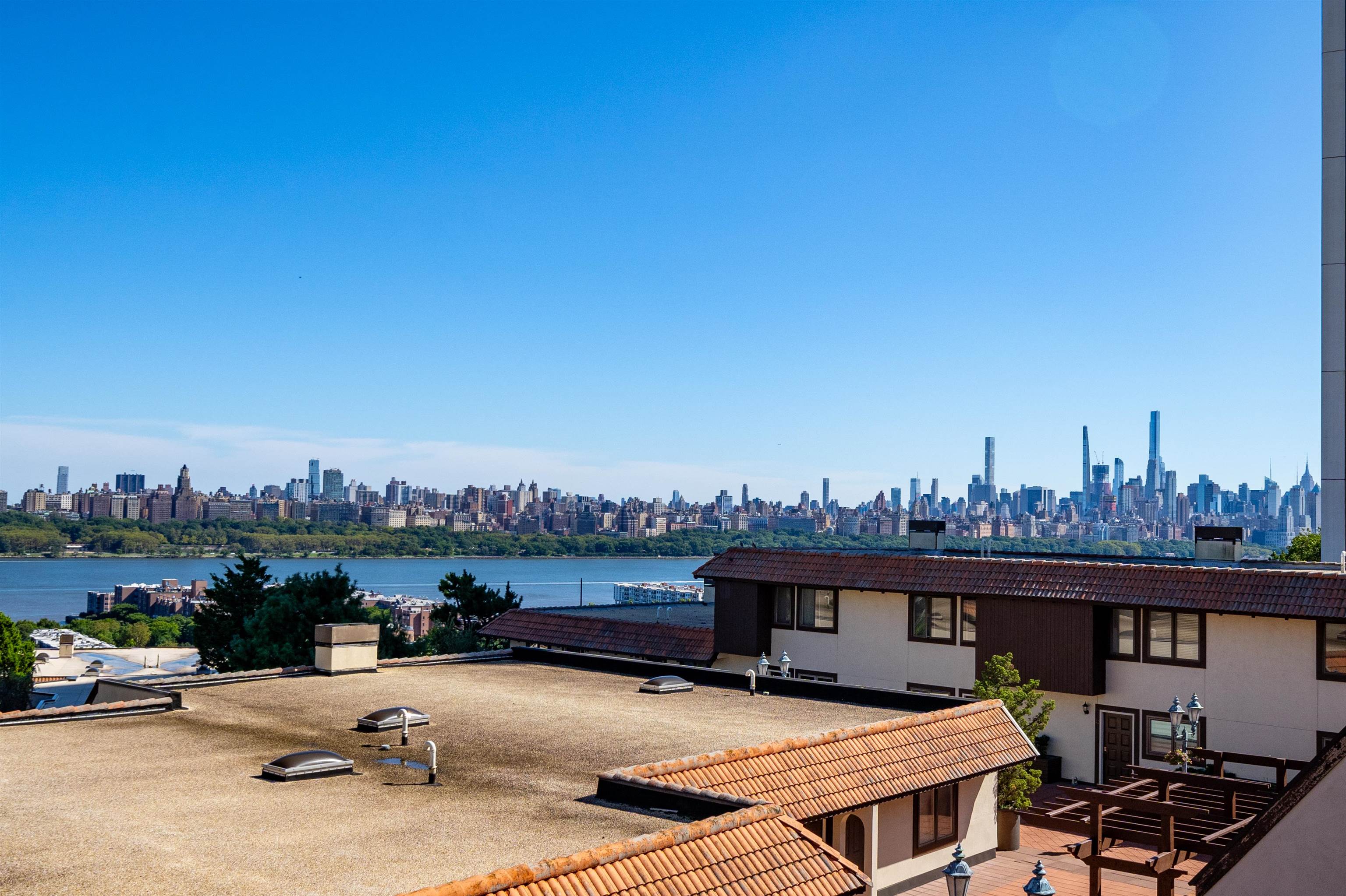 300 Gorge Road, Unit 59 Cliffside Park, NJ 07010 - Photo 11 of 14 a view of a terrace with sitting area