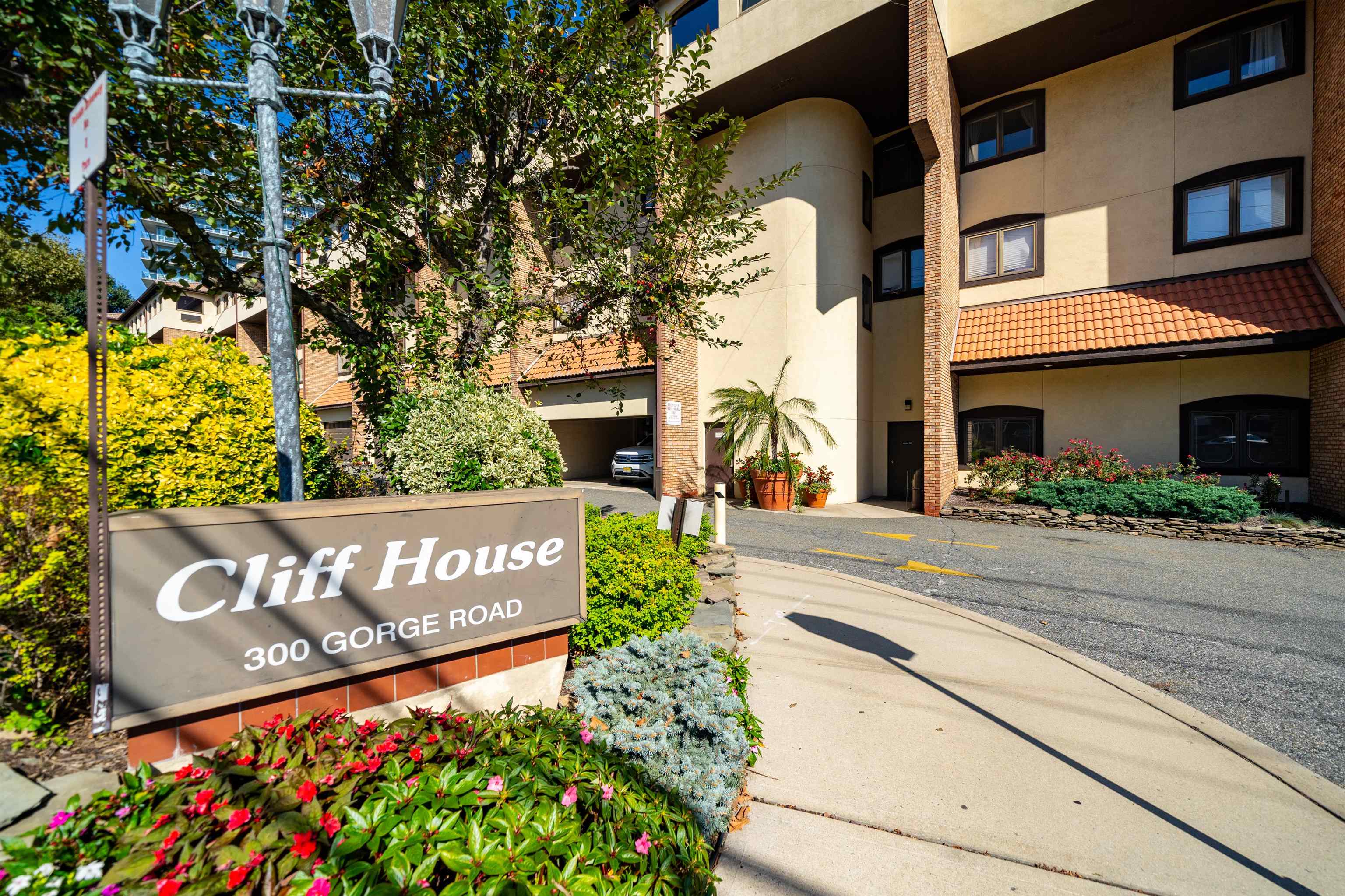 300 Gorge Road, Unit 59 Cliffside Park, NJ 07010 - Photo 13 of 14 a sign on the side of a building