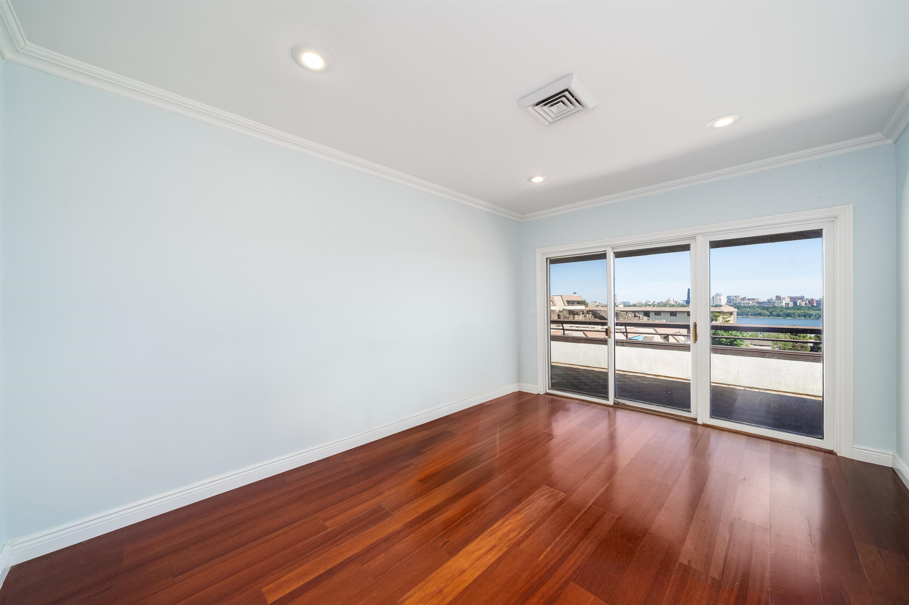 300 Gorge Road, Unit 59 Cliffside Park, NJ 07010 - Photo 7 of 14 a view of a kitchen with a sink and wooden floor