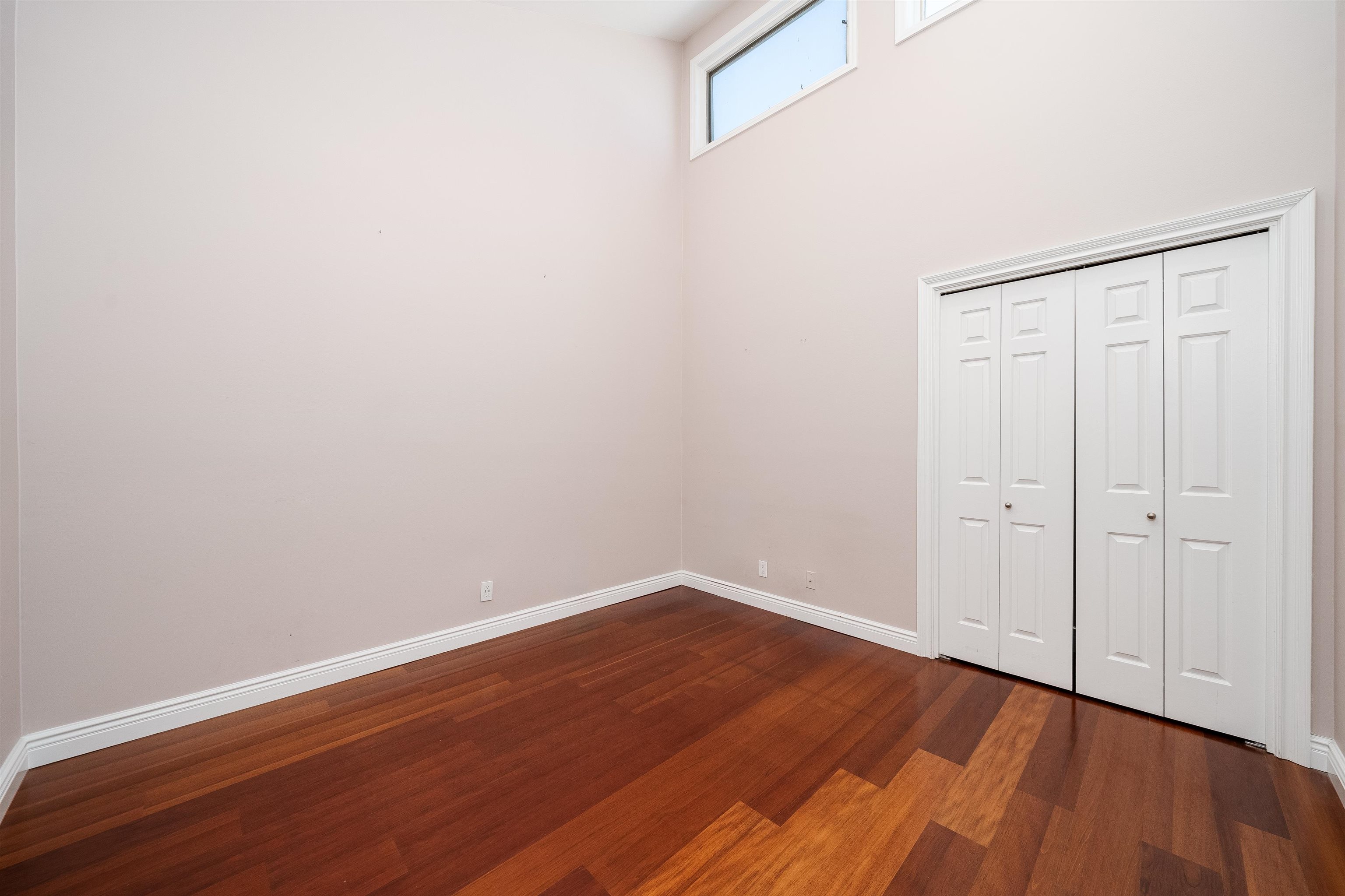 300 Gorge Road, Unit 59 Cliffside Park, NJ 07010 - Photo 8 of 14 a view of an empty room with wooden floor