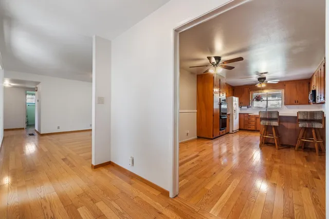 a room with lots of table and chairs