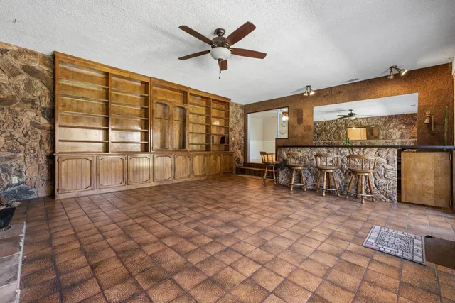 a kitchen with a sink and a window