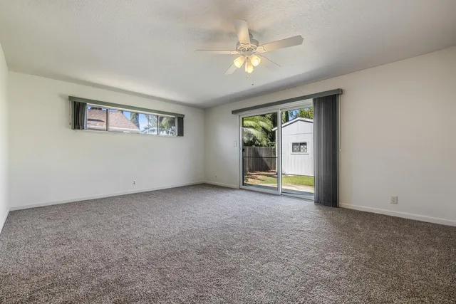 a view of a backyard with a garden