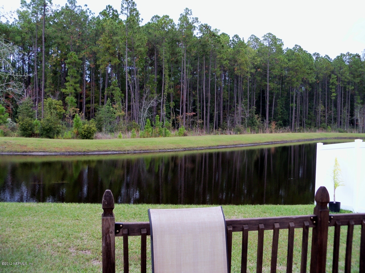 9135 Raptor Drive Jacksonville, FL 32221 - Photo 2 of 15 a view of a deck with a yard