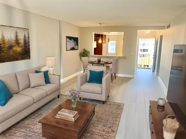 a living room with furniture and a couch