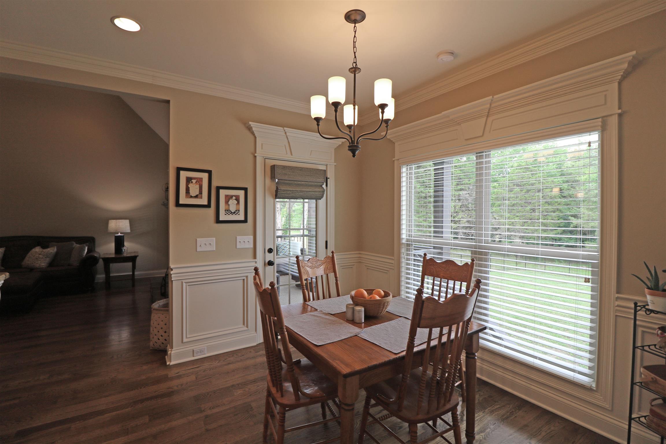 1235 Mires Road Mount Juliet, TN 37122 - Photo 11 of 30 The 11 x 11 breakfast area offers a large triple window with heavy trim detail, crown molding, wainscoting, hardwood flooring, French door to access the back porch, and a gorgeous view of the backyard.