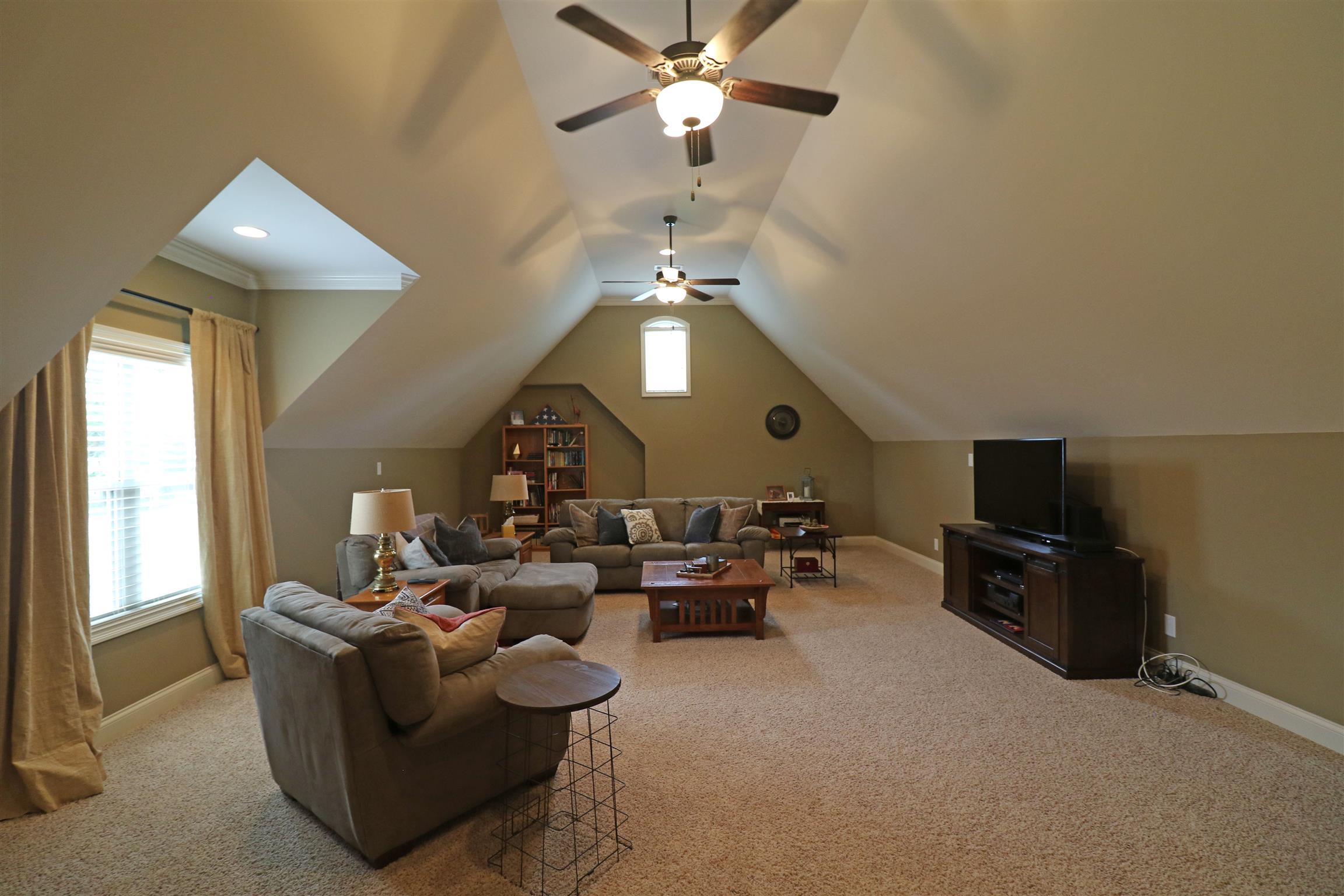 1235 Mires Road Mount Juliet, TN 37122 - Photo 13 of 30 Recreational Room: 30 x 20 Located above the garage, this spacious rooms offers a pitched ceiling, raised 6’ knee walls, recessed lighting, pre-wired for surround sound, two ceiling fans, and faux wood blinds