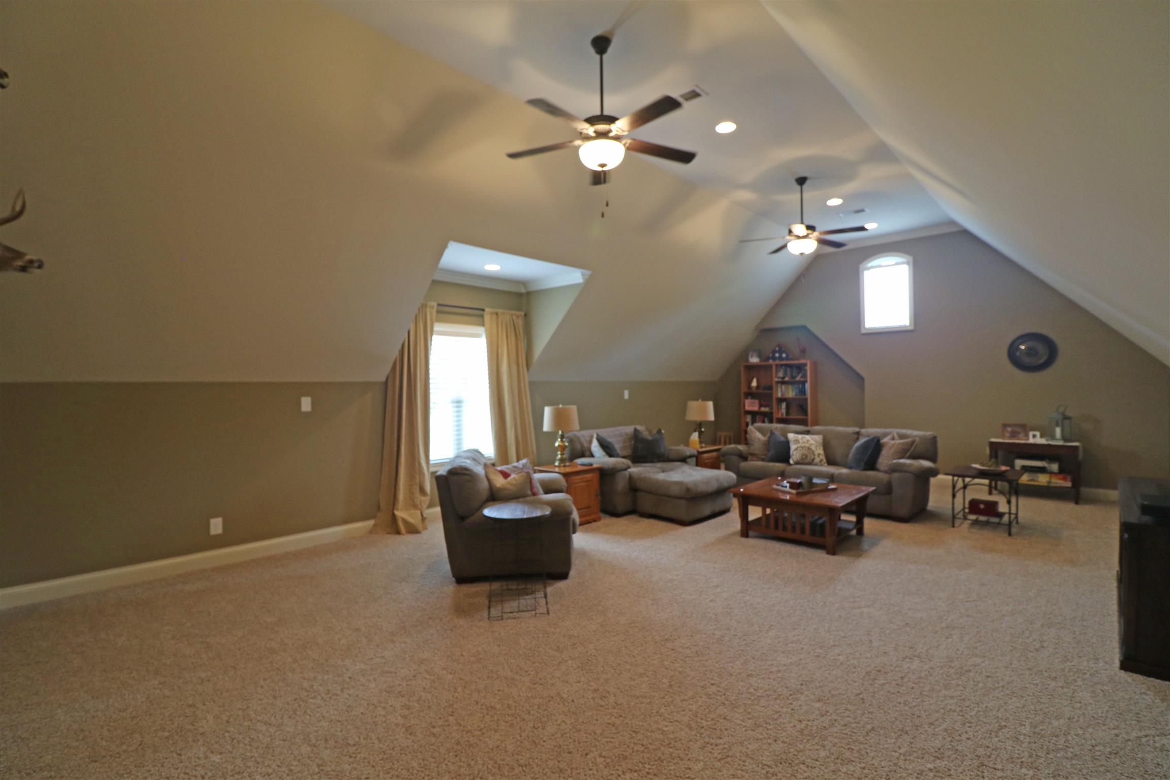1235 Mires Road Mount Juliet, TN 37122 - Photo 14 of 30 Recreational Room: 30 x 20 Located above the garage, this spacious rooms offers a pitched ceiling, raised 6’ knee walls, recessed lighting, pre-wired for surround sound, two ceiling fans, and faux wood blinds