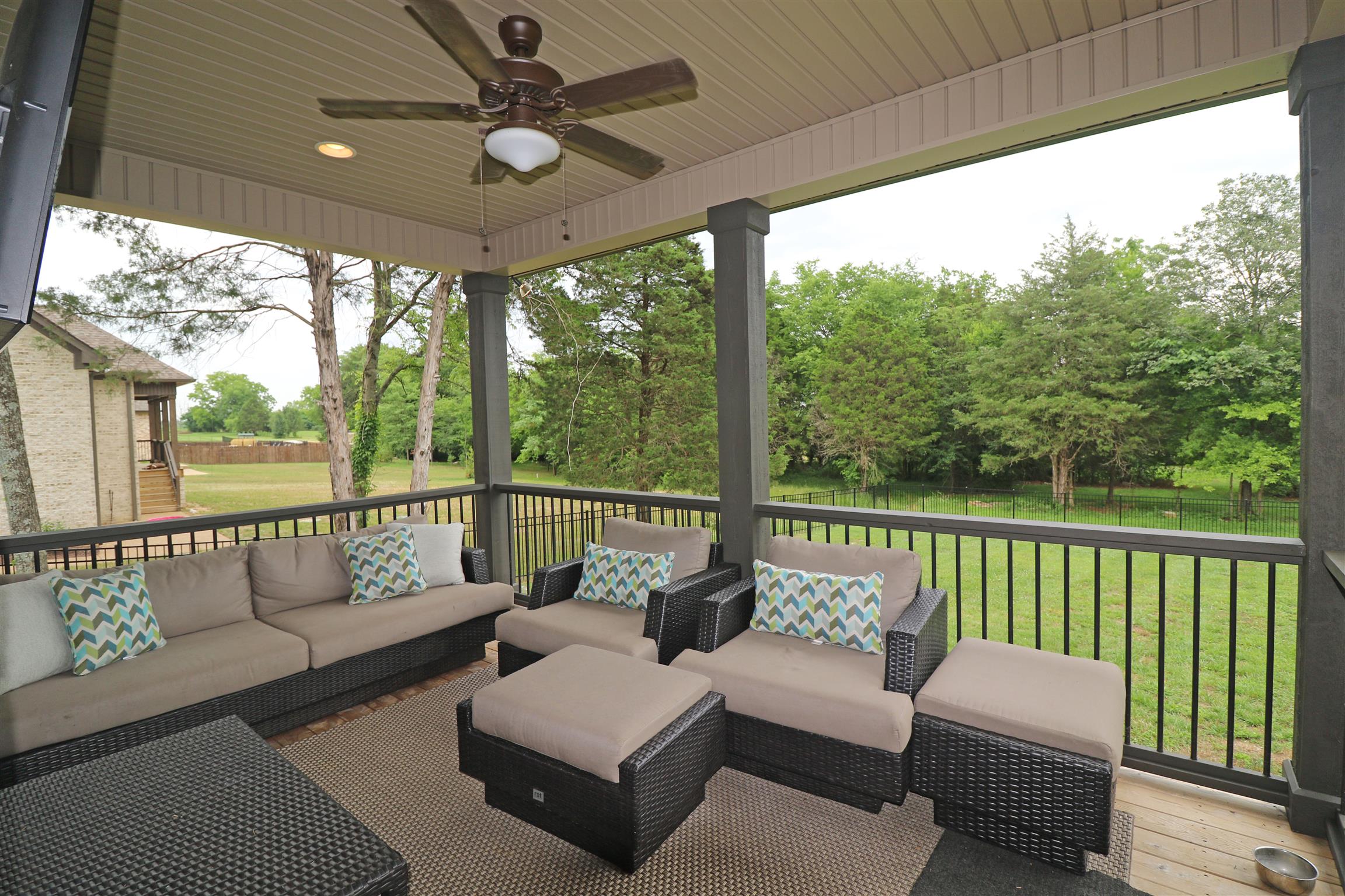 1235 Mires Road Mount Juliet, TN 37122 - Photo 26 of 30 15 x 12 covered back porch with ceiling fan/light, recessed lighting, access into the breakfast area, and offers a gorgeous view of the back yard.