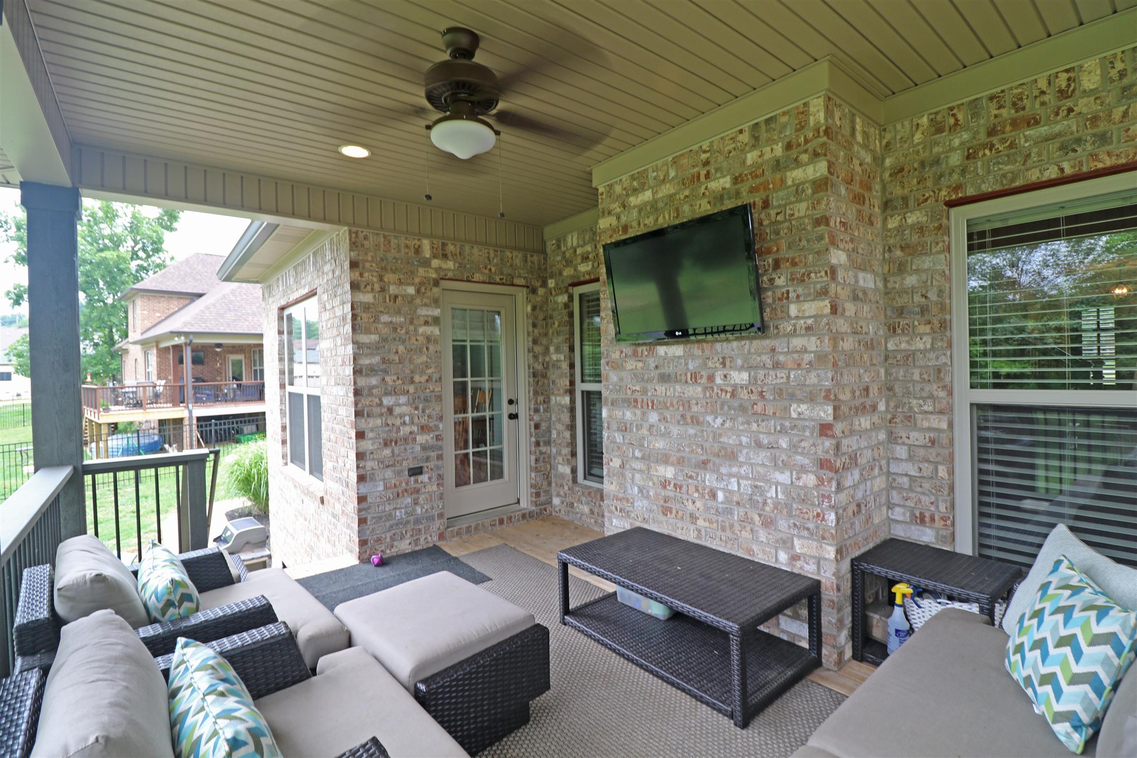 1235 Mires Road Mount Juliet, TN 37122 - Photo 27 of 30 15 x 12 covered back porch with ceiling fan/light, recessed lighting, access into the breakfast area, and offers a gorgeous view of the back yard.