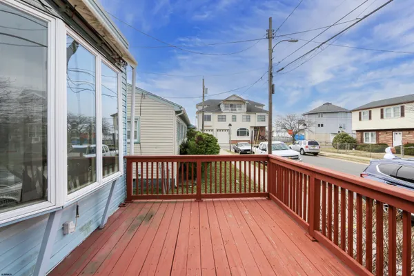 a view of a houses with a balcony