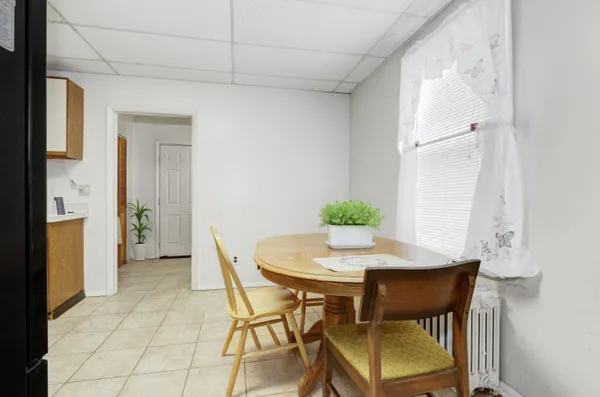 a view of a dining room with furniture