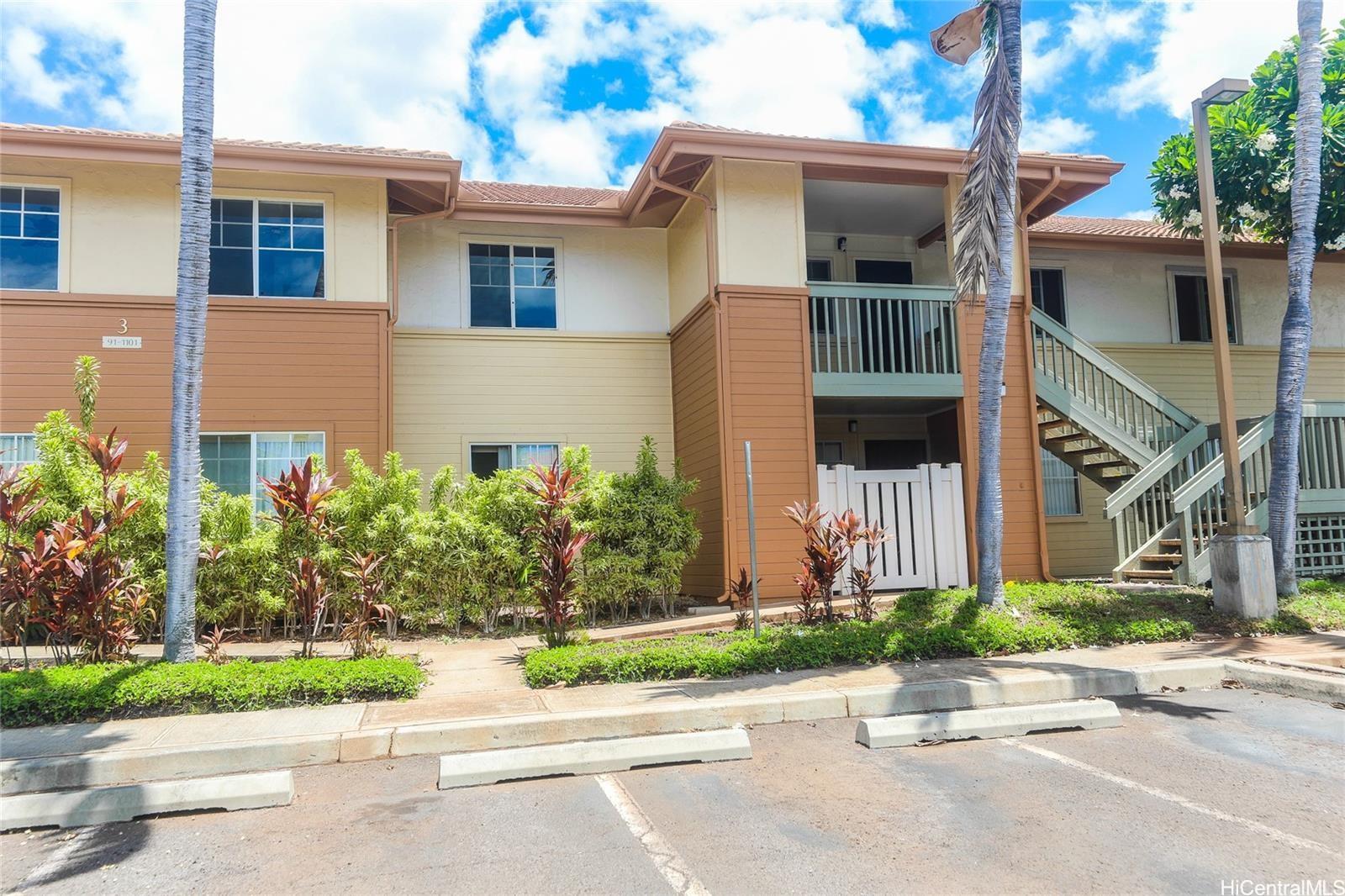91-1101 Namahoe Street, Unit 3H Kapolei, HI 96707 - Photo 15 of 25 front view of a house and a small yard