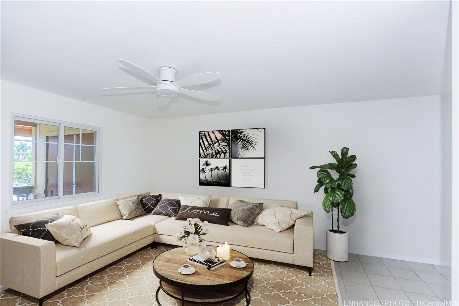 91-1101 Namahoe Street, Unit 3H Kapolei, HI 96707 - Photo 2 of 25 a living room with furniture and a potted plant