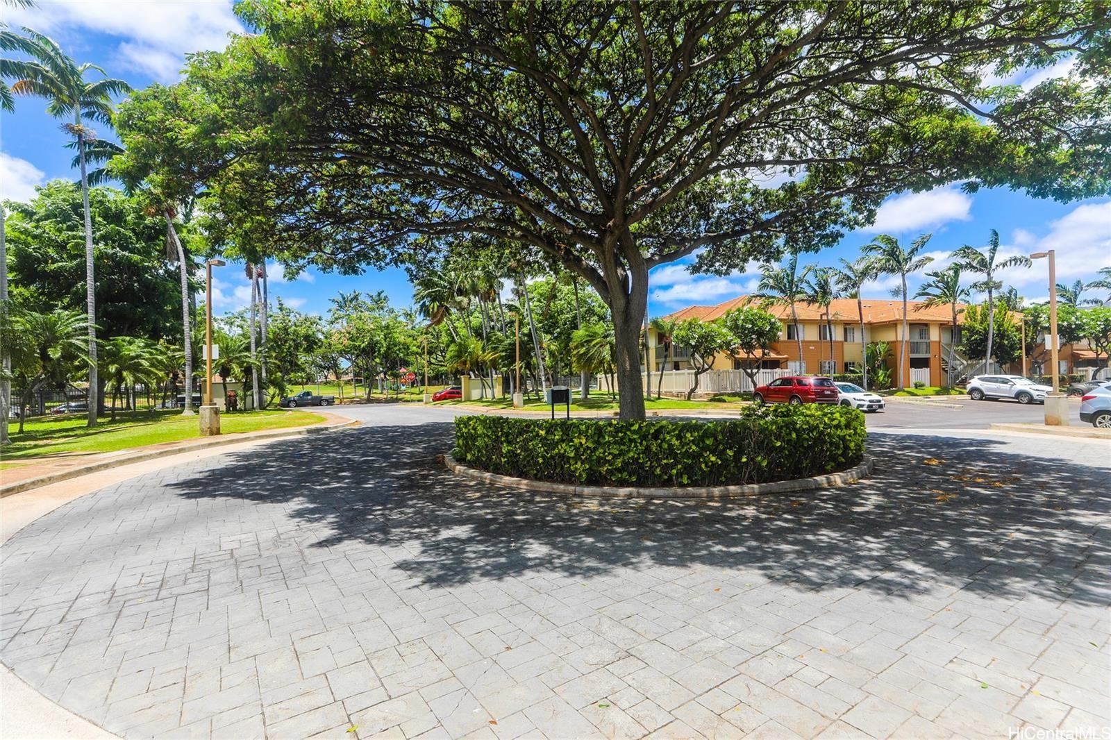 91-1101 Namahoe Street, Unit 3H Kapolei, HI 96707 - Photo 25 of 25 a view of a park with large trees