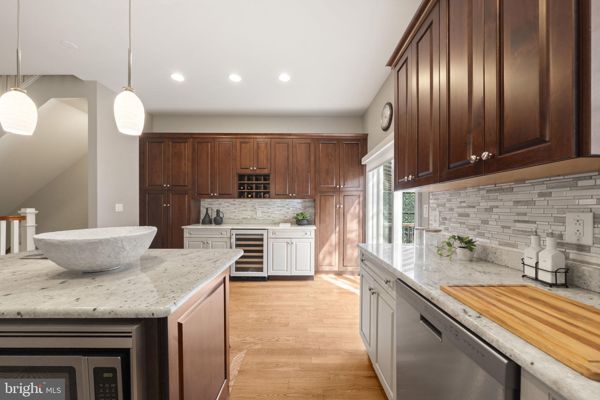 220 Gaskill Street Philadelphia, PA 19147 - Photo 23 of 60 Elegant kitchen with rich cabinetry.