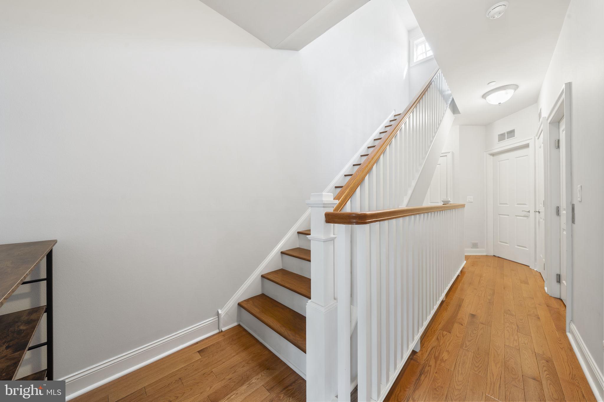 220 Gaskill Street Philadelphia, PA 19147 - Photo 43 of 60 Bright and inviting entryway staircase.
