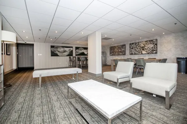 a view of a workspace with furniture