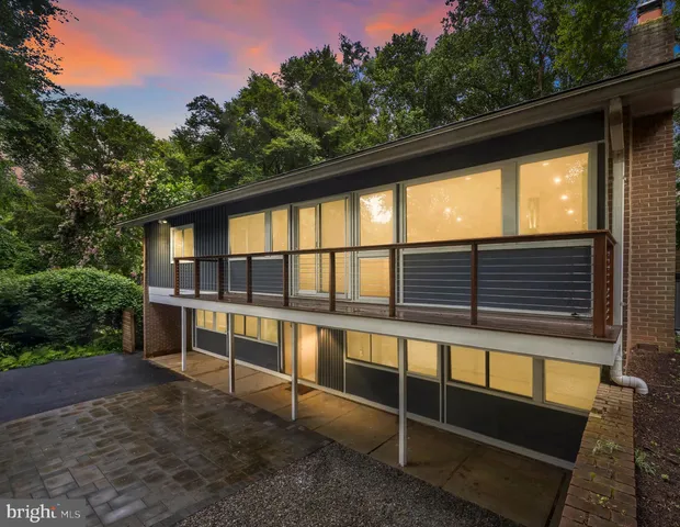 a view of balcony with yard