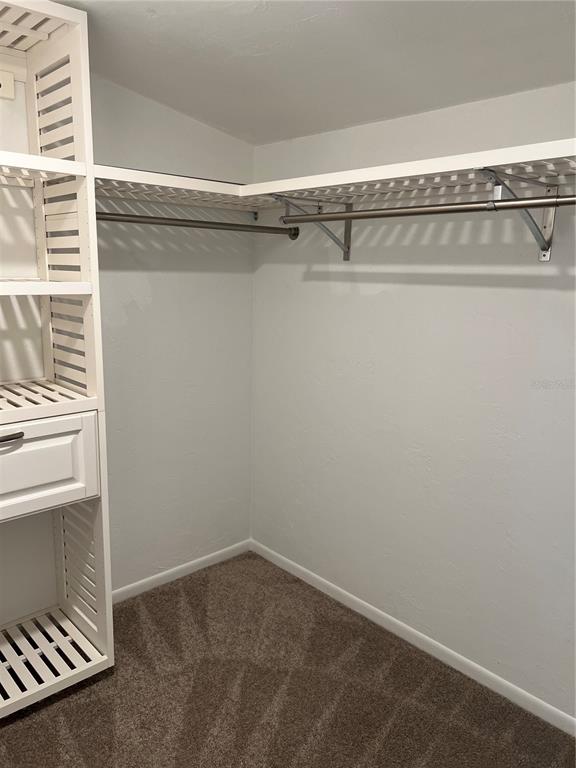 686 White Pine Tree Road, Unit 64 Venice, FL 34285 - Photo 16 of 20 a view of a room with rack on the wall