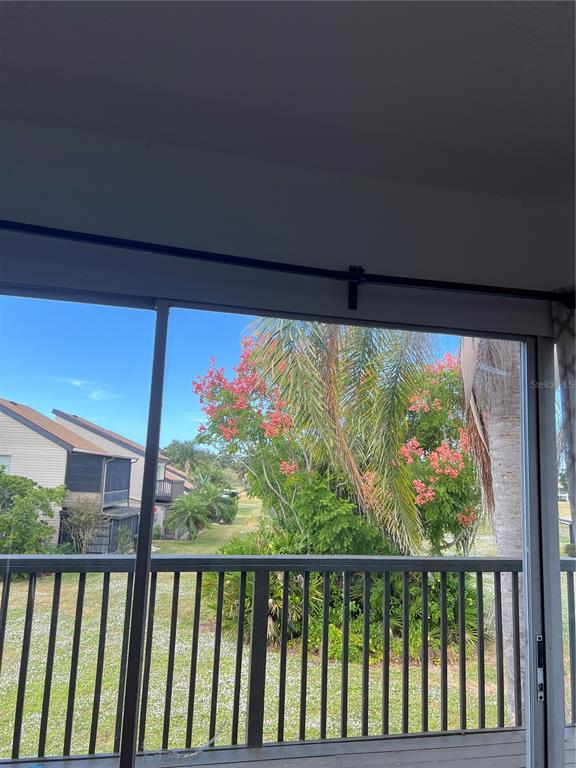 686 White Pine Tree Road, Unit 64 Venice, FL 34285 - Photo 6 of 20 a view of a porch