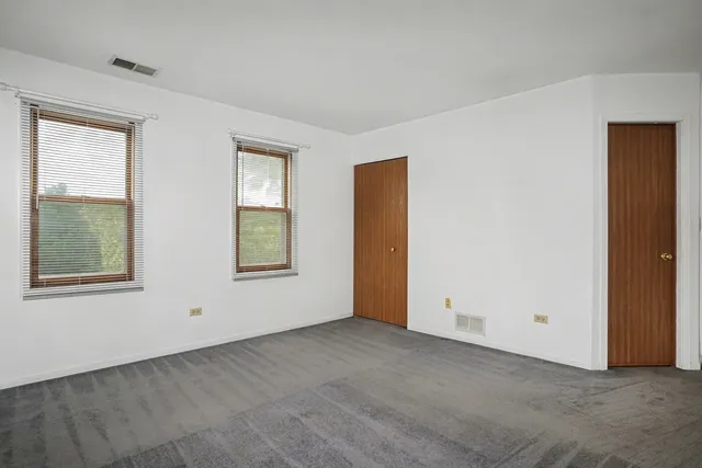 a view of an empty room with window