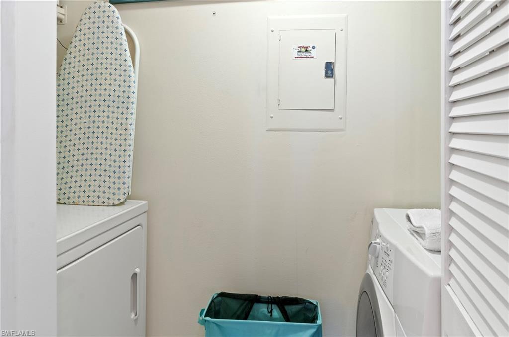 21 High Point Circle East, Unit 308 Naples, FL 34103 - Photo 22 of 31 laundry room
