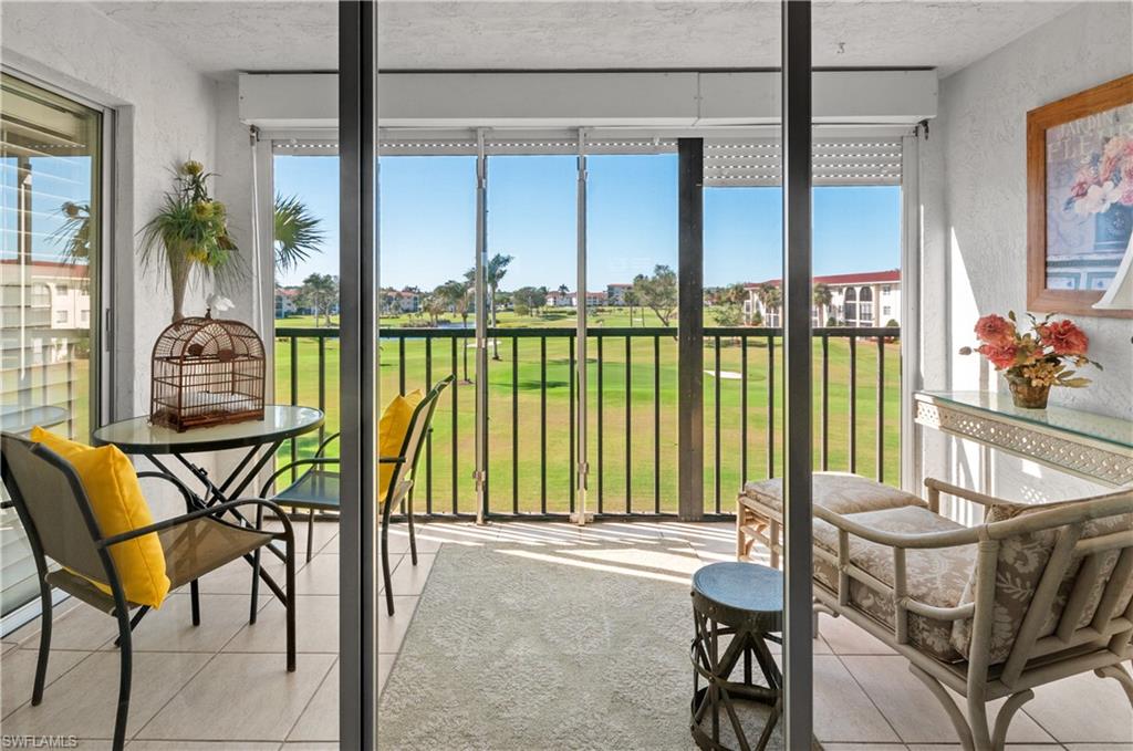 21 High Point Circle East, Unit 308 Naples, FL 34103 - Photo 23 of 31 screened lanai, wonderful sunsets
