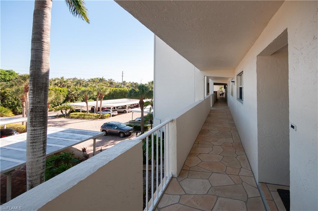 21 High Point Circle East, Unit 308 Naples, FL 34103 - Photo 24 of 31 entance to condo