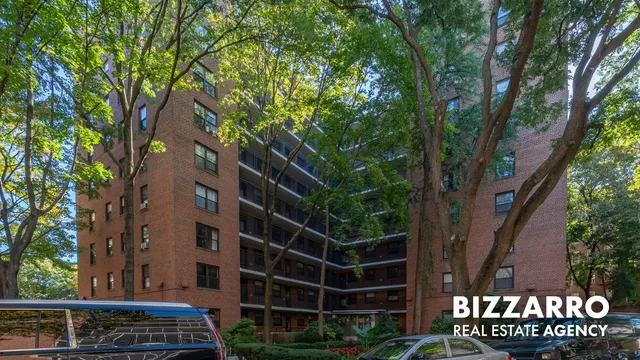 a view of a building with a tree