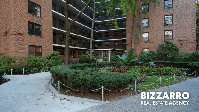 a view of a chair and table in backyard