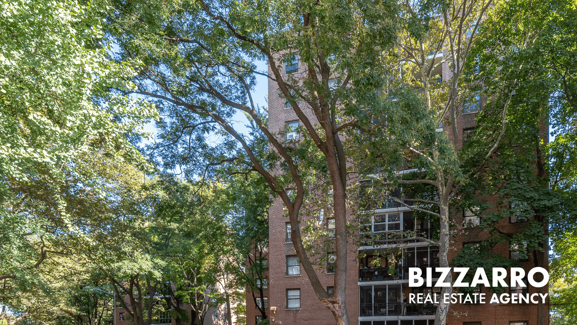 35-11 85th Street, Unit 9A Queens, NY 11372 - Photo 20 of 21 a view of a house with a tree