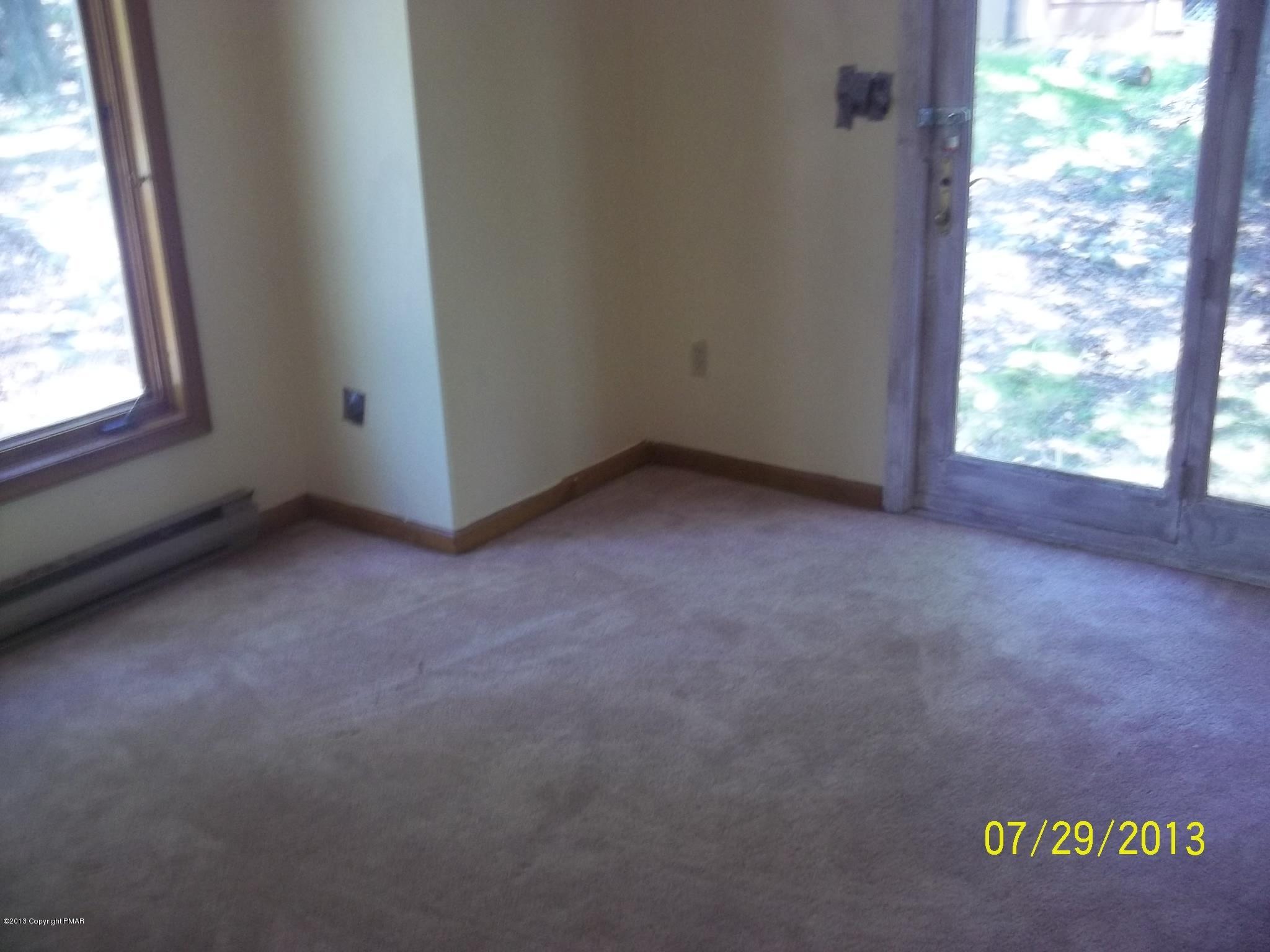 1092 Elgin Way Bushkill, PA 18324 - Photo 8 of 19 an empty room with windows
