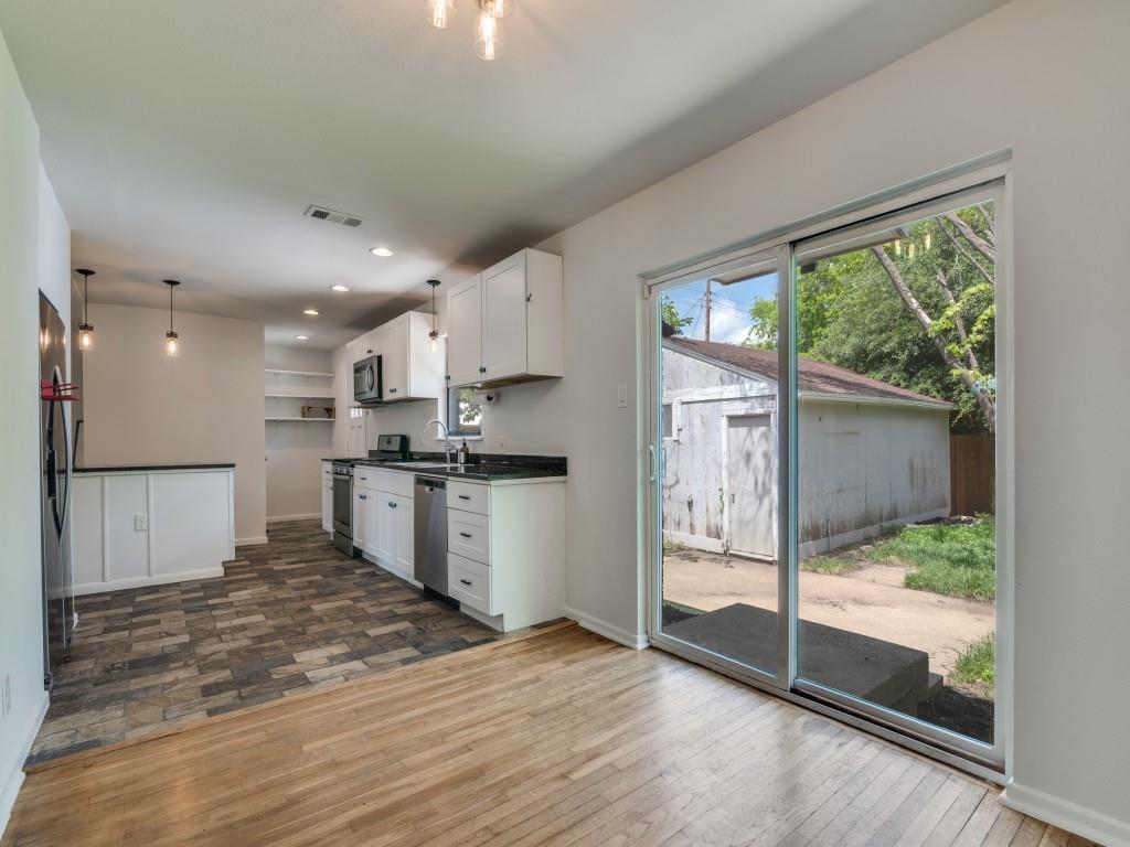 2315 Inadale Avenue Dallas, TX 75228 - Photo 18 of 36 a view of kitchen with wooden floor and window
