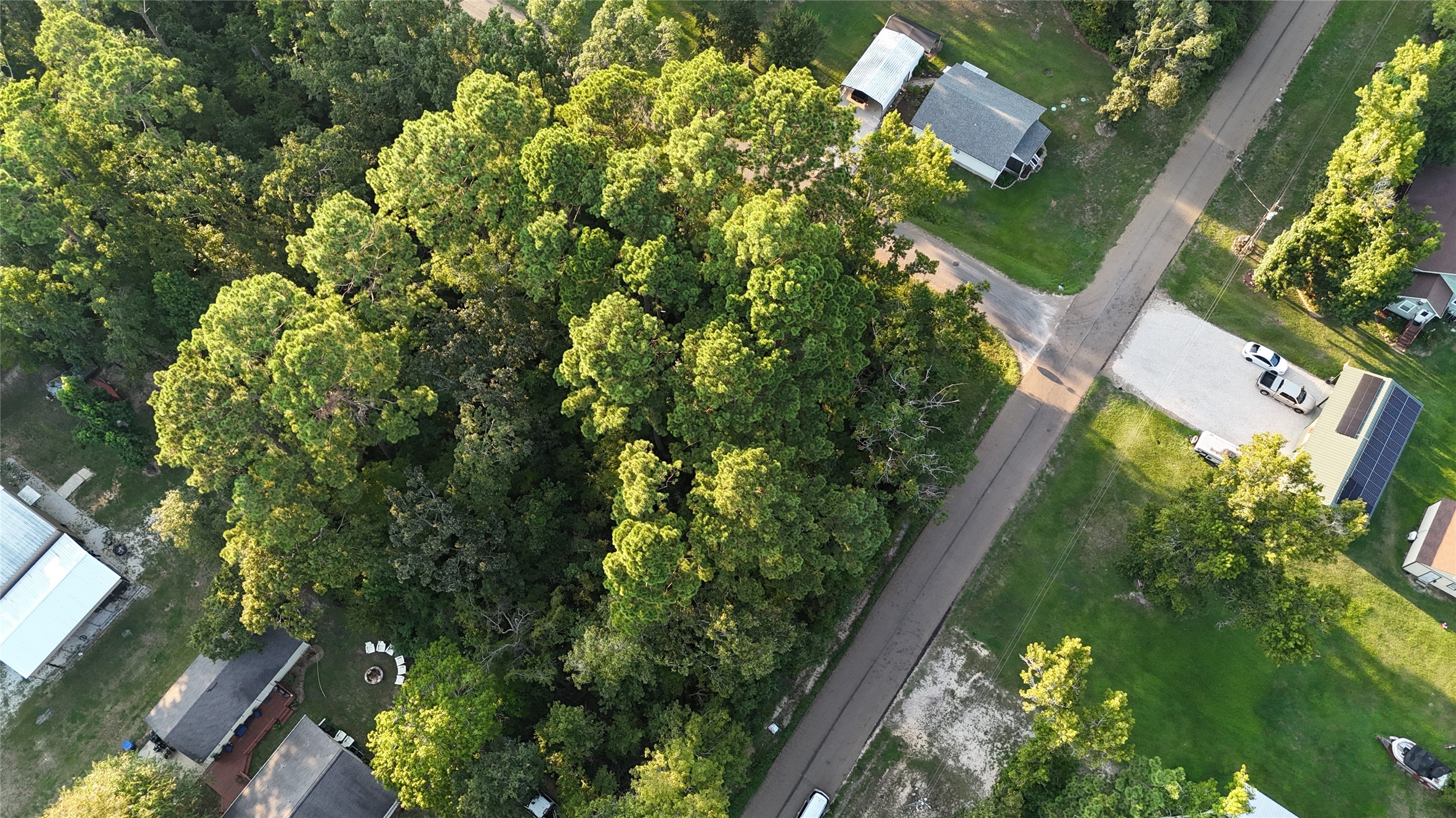 Tbd Laurel Road Onalaska, TX 77360 - Photo 5 of 6 an aerial view of a house with a yard