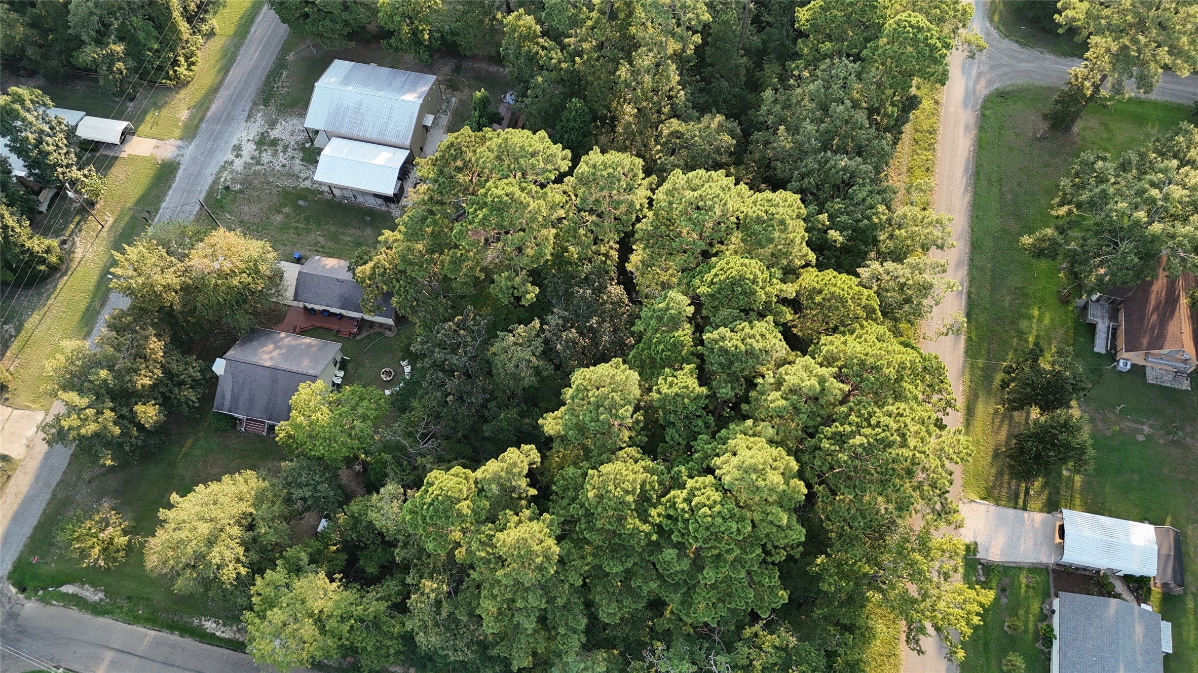 Tbd Laurel Road Onalaska, TX 77360 - Photo 7 of 7 an aerial view of residential house with outdoor space and trees all around