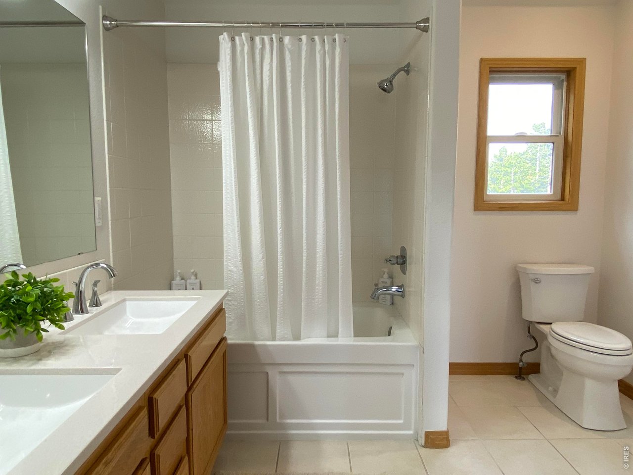 28 Valley View Lane Evergreen, CO 80439 - Photo 22 of 37 a bathroom with a sink a toilet and shower